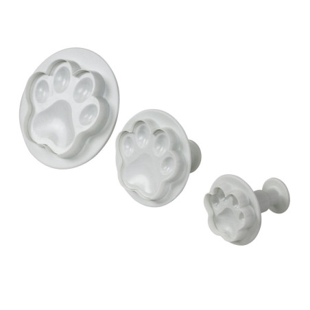 3 cortadores de galletas con forma de eyector de pata de perro