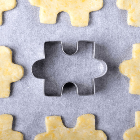 pieza del rompecabezas del cortador de galletas
