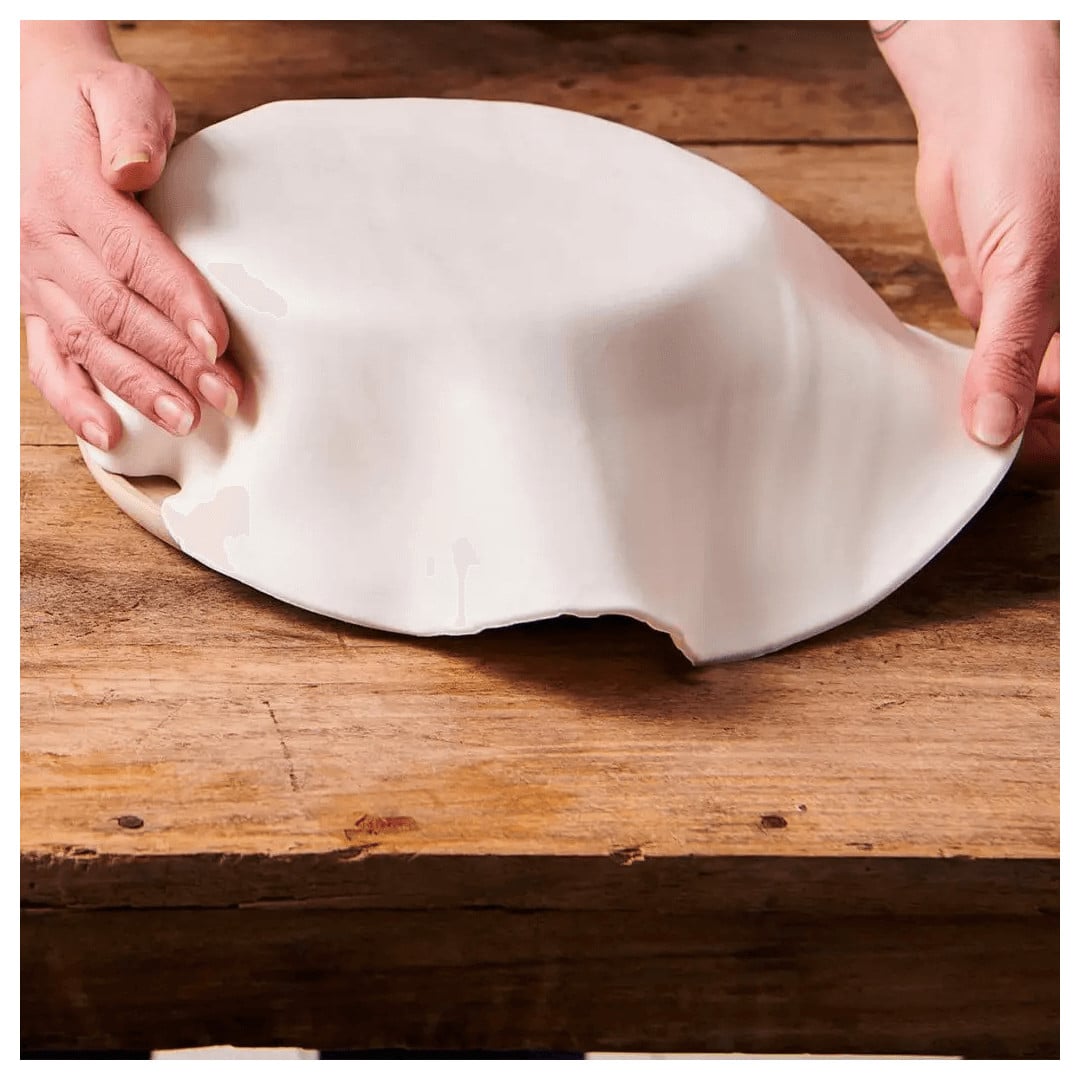 rollo de pastelitos divertidos de pasta de azúcar blanca