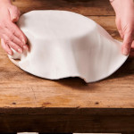 rollo de pastelitos divertidos de pasta de azúcar blanca