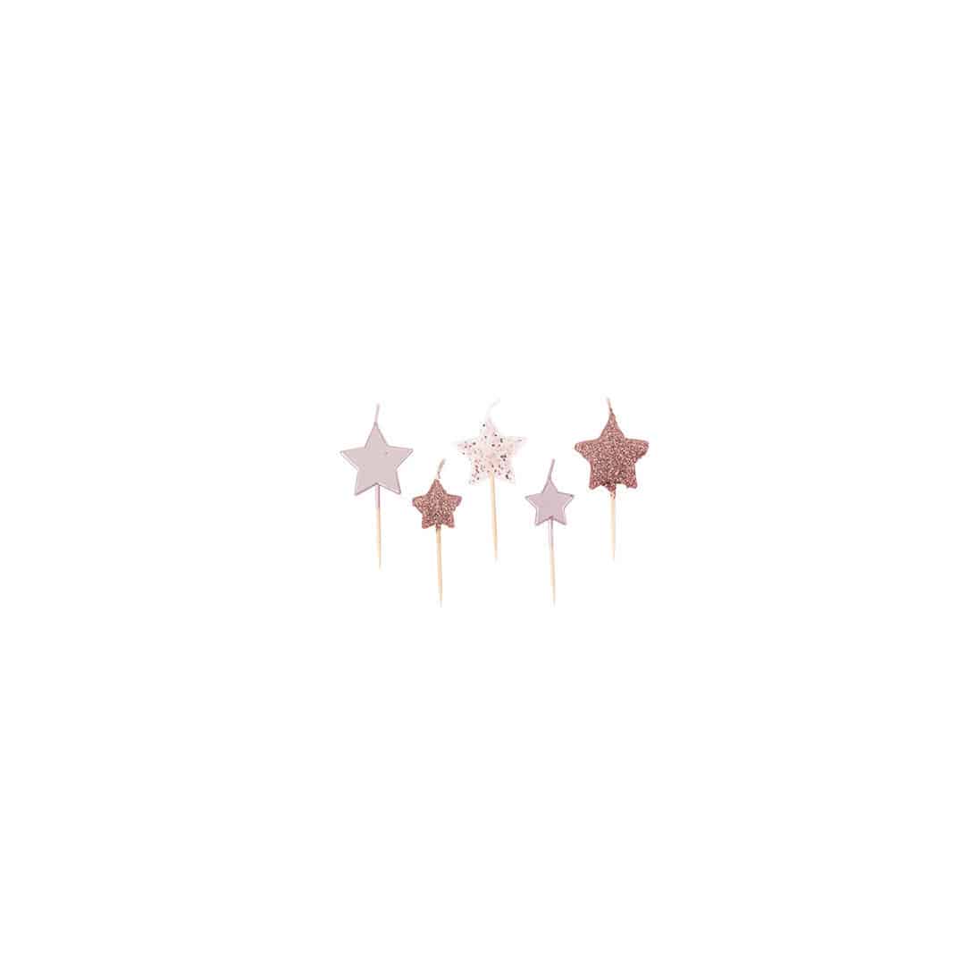 Velas de cumpleaños con estrella de oro rosa.