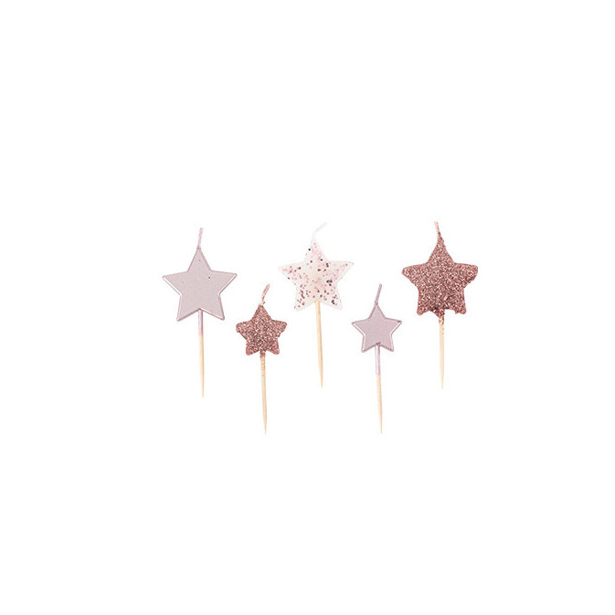 Velas de cumpleaños con estrella de oro rosa.