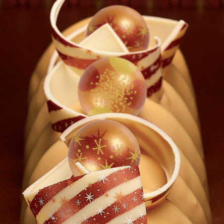 Tronco de Navidad decorado con bouel de chocolate.