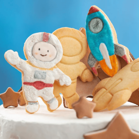 Galleta de cohete y cosmonauta