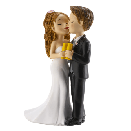 Figura de una pareja casada besándose de perfil.