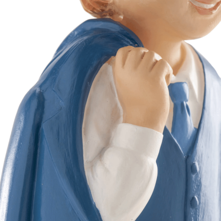 Detalles de la figurita de niño para la comunión