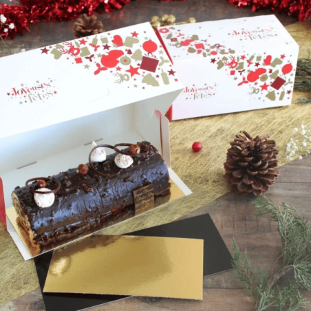 Presentación de una caja de leña blanca y roja con motivos navideños.